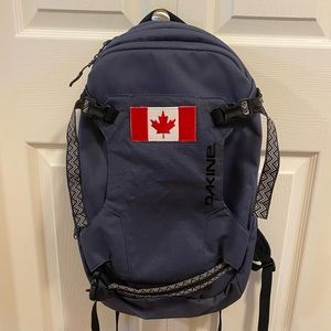 Dakine Heli Pack 12 L backpack with Canadian Flag patch